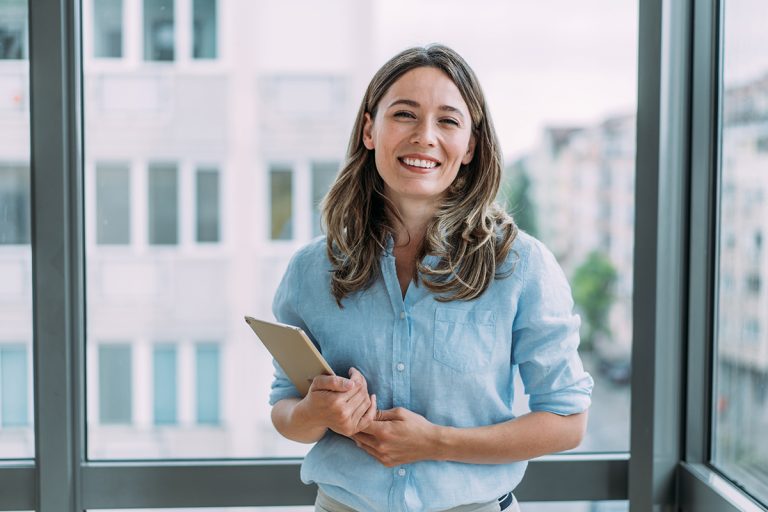 Confident businesswoman in modern office